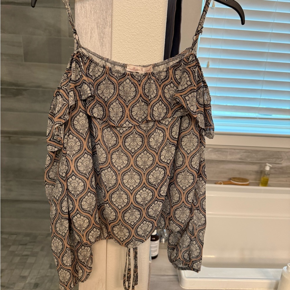 Elegant Black and Cream Patterned Blouse